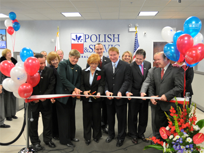 M. Fryzel and members of PSFCU Board of Directors cut the ceremonial ribbon at the Mt. Prospect branch